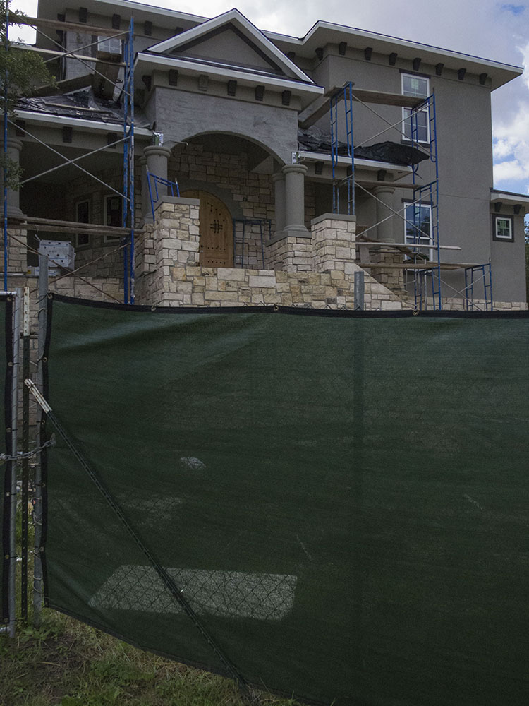 A Meyerland home is being built back on a foundation feet above ground level