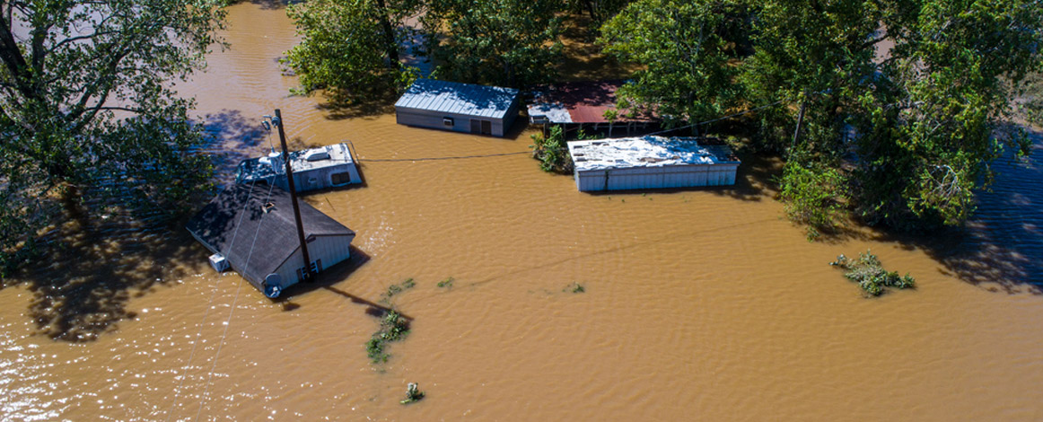 Muddy water flooding buildings